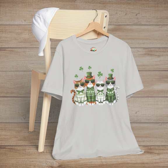 Silver t-shirt with a cute row of cartoon cats dressed for St. Patrick’s Day with green sweaters, clovers, and cool sunglasses