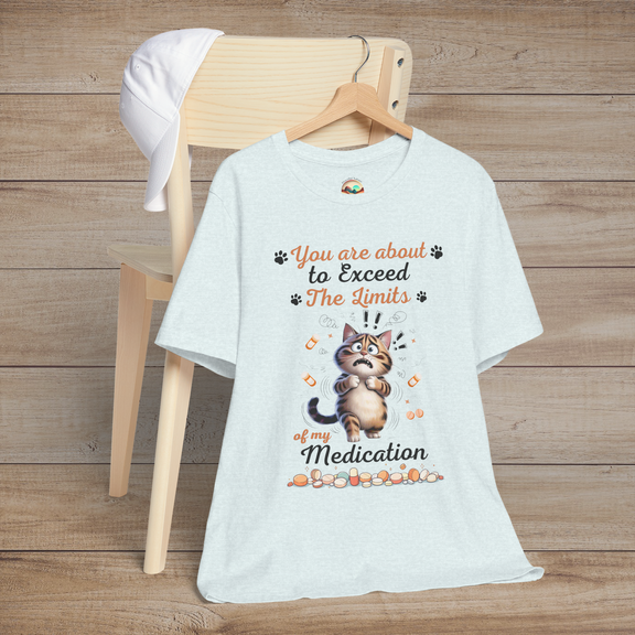 Funny heather ice blue t-shirt with a cat graphic and text on a wooden background