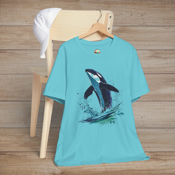 Turquoise Bella+Canvas tee with orca whale mid-leap in marine spray