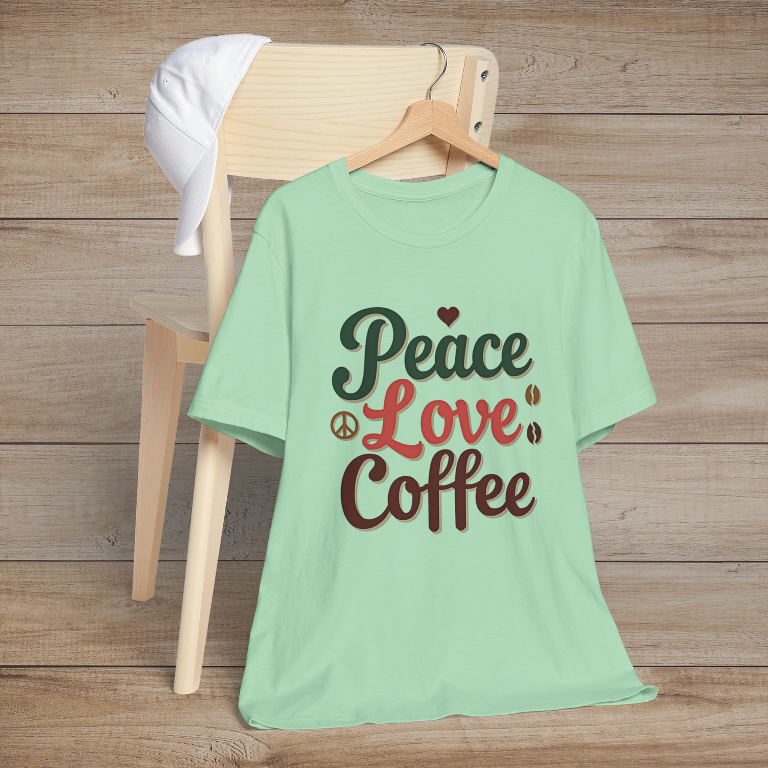 Peace Love Coffee t-shirt in mint green – retro coffee shirt with colorful typography