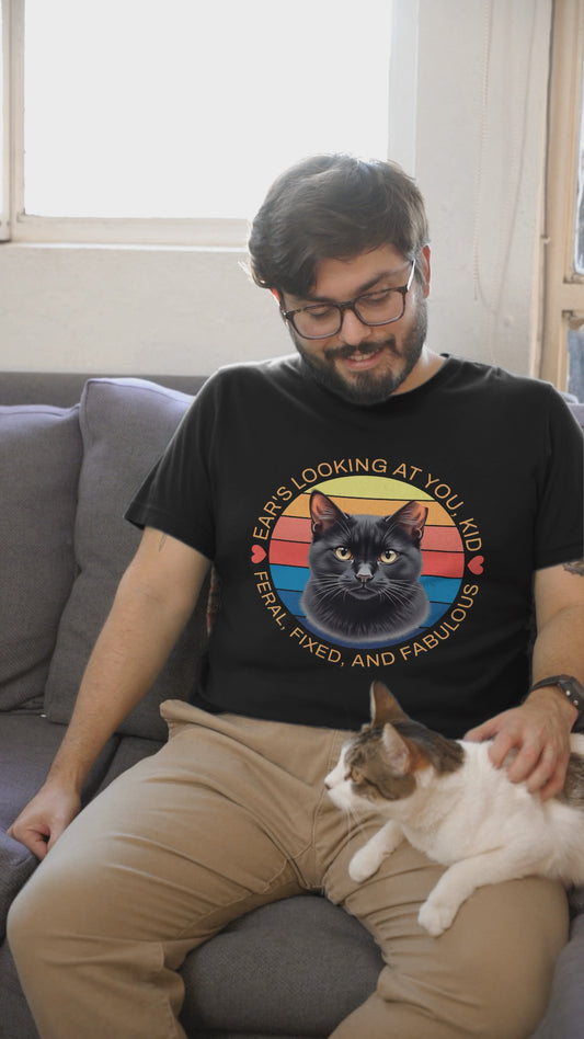 Video of man wearing black Ear’s Looking at You Kid TNR cat shirt with retro ear-tipped black cat design, Bella Canvas 3001