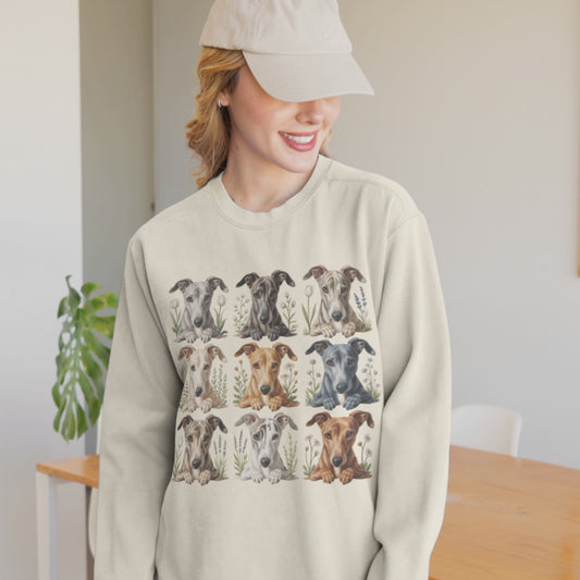 Video of happy woman wearing the ivory long sleeve cottagecore greyhound shirt featuring nine illustrated greyhounds with soft floral accents