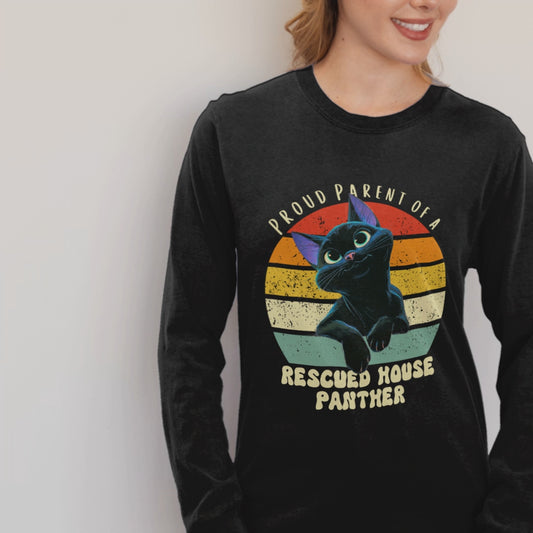 Lifestyle video of woman wearing Comfort Colors 6014 long-sleeve shirt with rescued house panther retro cat design