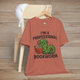 🐛 “I’m a Professional Bookworm” – Fun Graphic Tee for Reading Enthusiasts Heather Clay