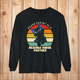 Comfort Colors white long-sleeve shirt with “Proud Parent of a Rescued House Panther” retro black cat design
