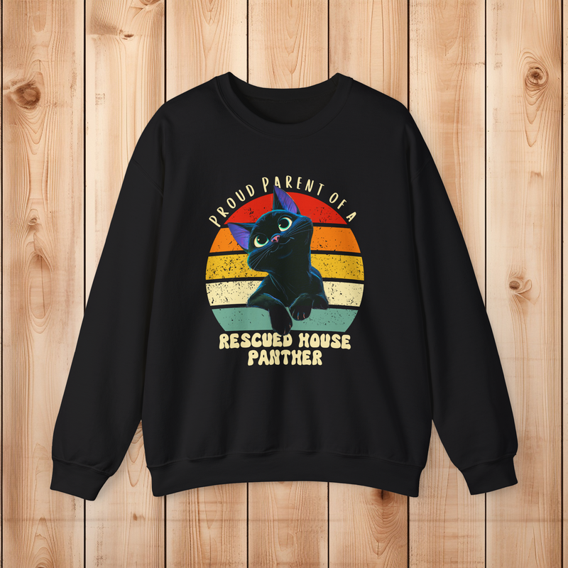 Black Gildan 18000 sweatshirt with a vintage sunset black cat graphic and Proud Parent of a Rescued House Panther text