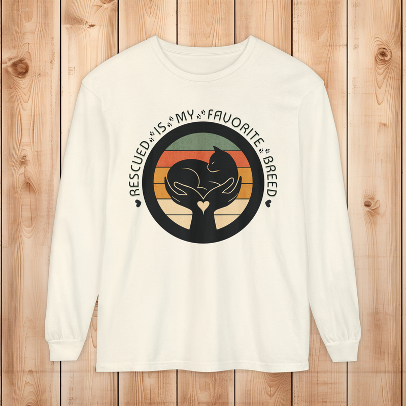 Ivory-colored long-sleeve Comfort Colors 6014 shirt, with retro rescued cat design saying Rescued Is My Favorite Breed