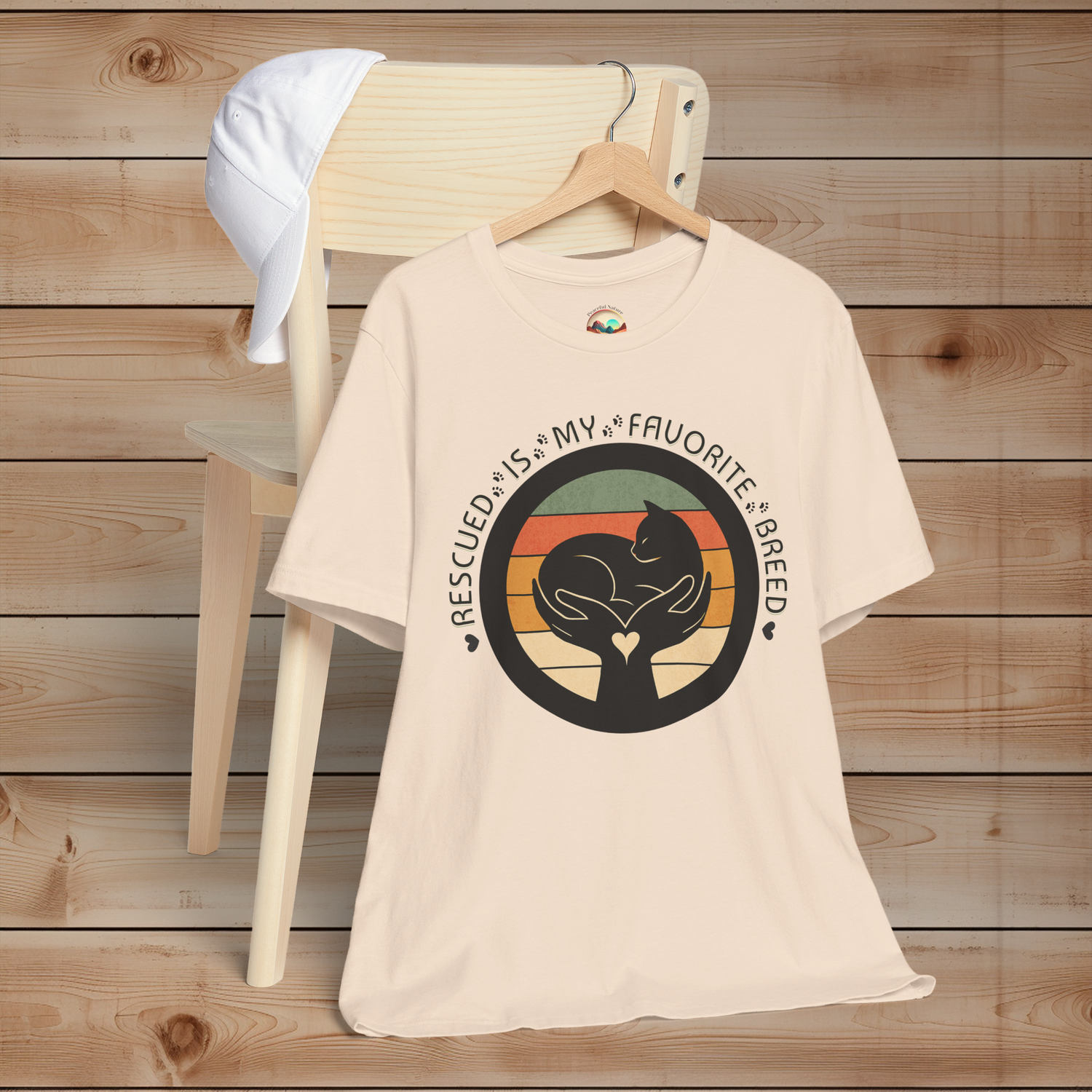 Soft Cream Bella+Canvas 3001 tee with ‘Rescued Is My Favorite Breed’ cat design – perfect gift for animal rescue advocates