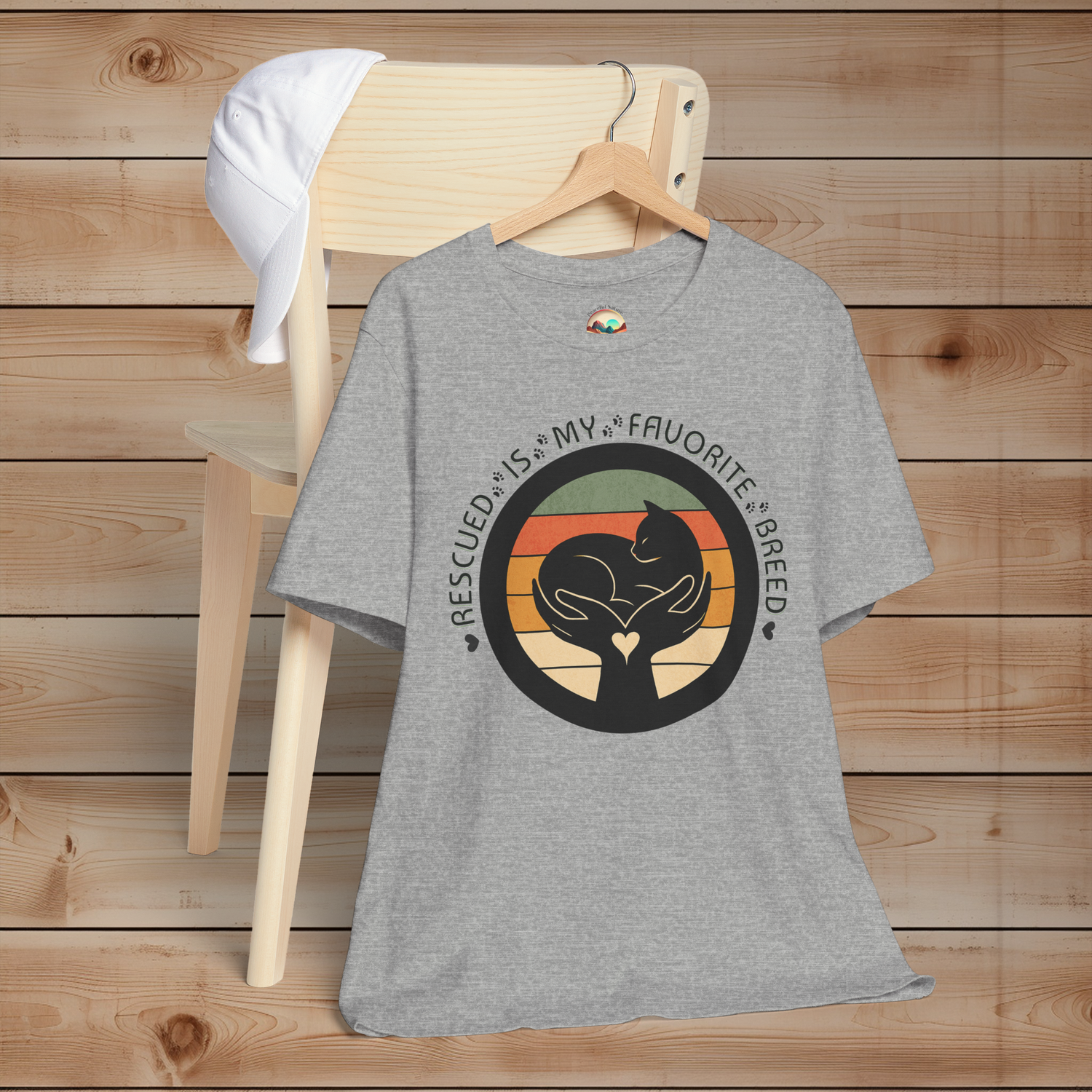Athletic Heather ‘Rescued Is My Favorite Breed’ T-shirt featuring black cat in loving hands retro design – Bella+Canvas 3001