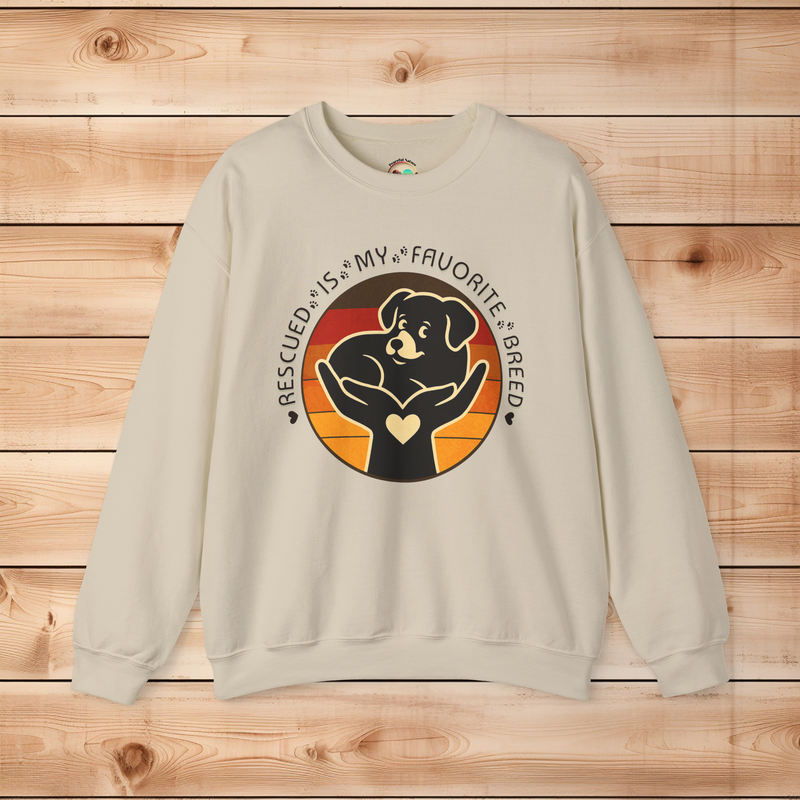 Sand color Gildan 18000 sweatshirt featuring Rescued Is My Favorite Breed dog rescue design with warm retro tones, ideal for Humane Society gifts.