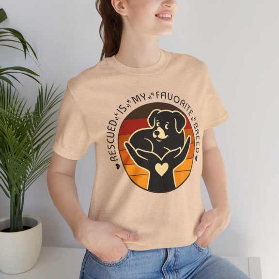 Lifestyle photo of Rescued Is My Favorite Breed T-Shirt in Heather Sand Dune – Dog Rescue Graphic Tee for Animal Lovers