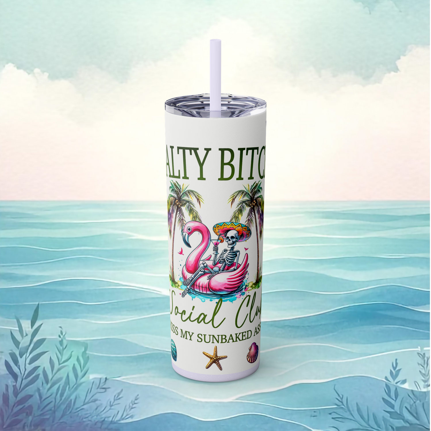Front view of the Salty Bitch Social Club skinny tumbler in glitter lilac, featuring a lounging skeleton in a pink flamingo float, palm trees, and beachy vibes