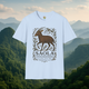 Saola Endangered Asian Unicorn T-Shirt in Light Blue – Showcasing a rare Saola design surrounded by elegant foliage. Eco-friendly soft cotton shirt photographed with misty mountains in the background