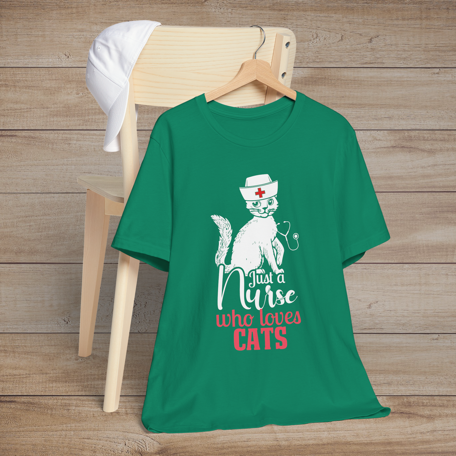 Kelly green t-shirt with an adorable white nurse cat design and the fun message Just a Nurse Who Loves Cats