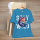 Aqua Stay Wild Fox t-shirt flatlay with vibrant colorful fox illustration