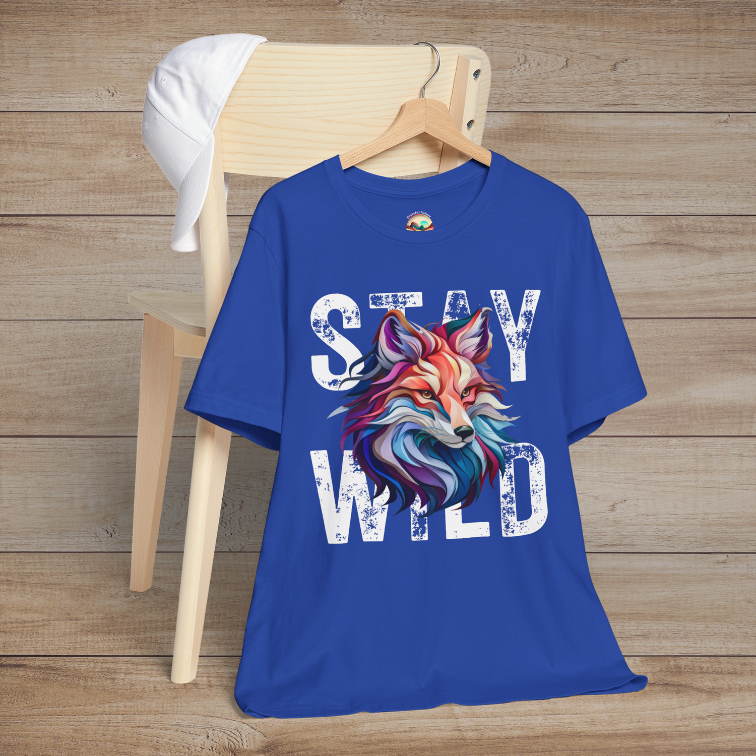 Royal Blue Stay Wild Fox t-shirt flatlay with vibrant fox art