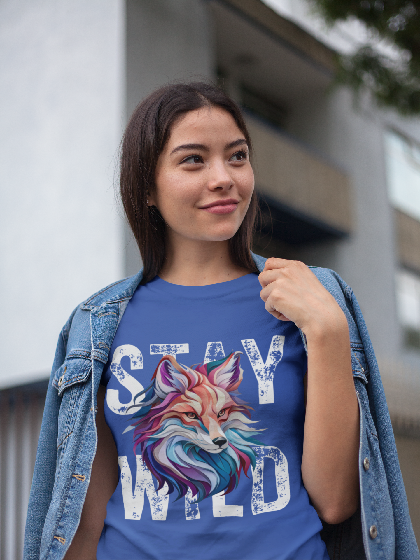 Woman smiling outdoors wearing Royal Blue Stay Wild Fox t-shirt