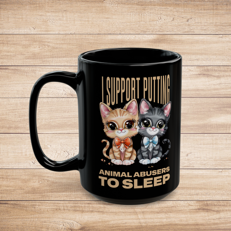 Left view of a 15oz black mug with cute kittens and savage slogan standing for animal rights.
