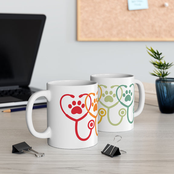 11 oz vet appreciation mug on desk with two mugs visible – left and right design context