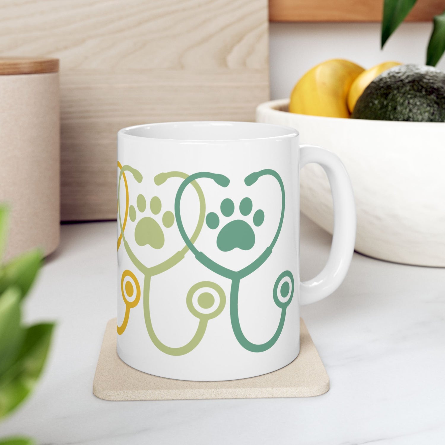 11 oz veterinary mug showing green and yellow stethoscope hearts – right context view