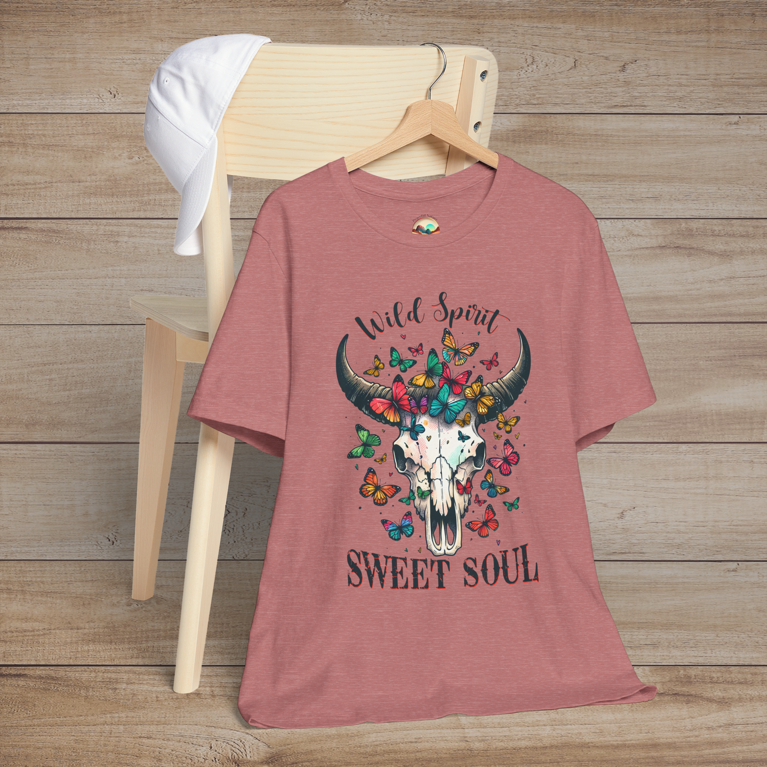Heather mauve Wild Spirit Sweet Soul T-Shirt featuring a skull surrounded by vibrant butterflies free spirit design