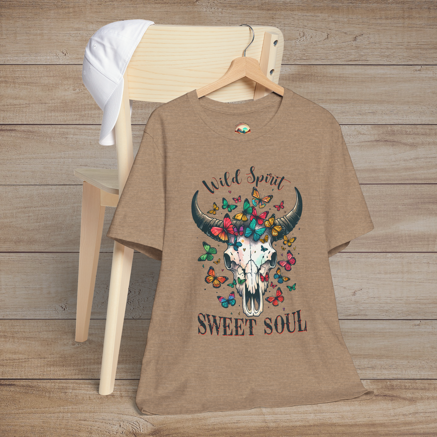 Heather tan Wild Spirit Sweet Soul T-Shirt with buffalo skull art and vivid butterflies perfect for bohemian style lovers